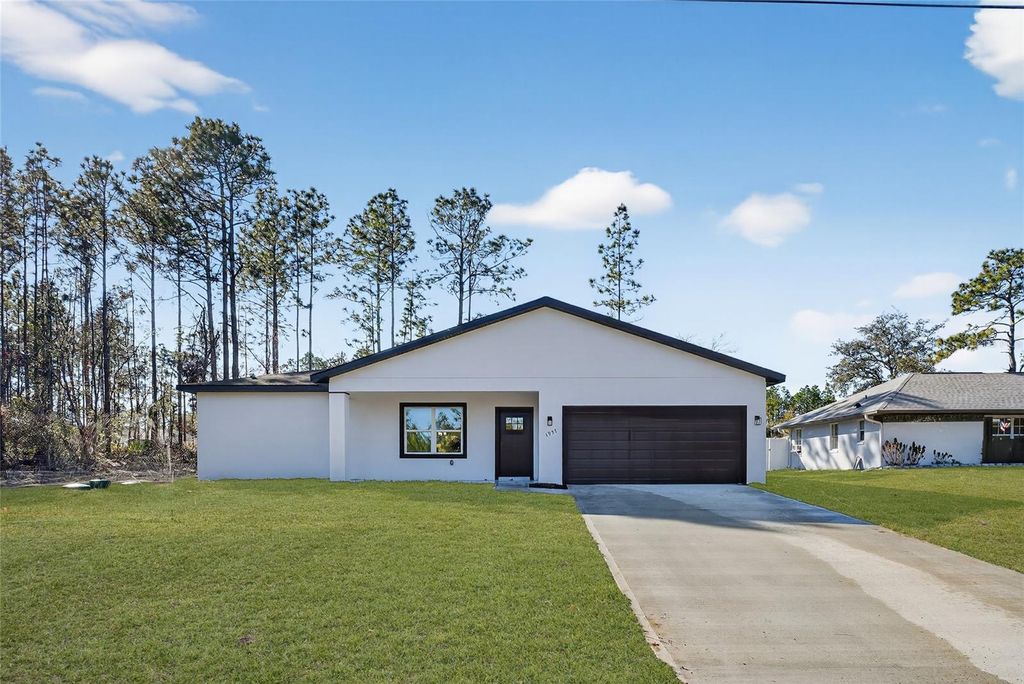 Photo of 1957 W Oliver Drive, Citrus Springs, FL 34434 (MLS # O6381754)
