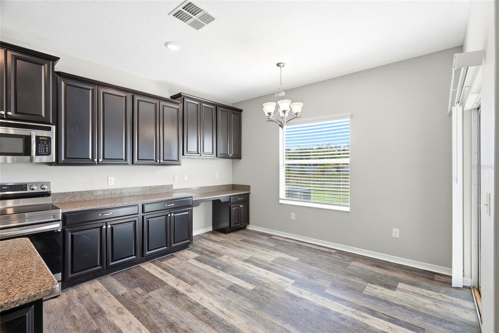 Photo of 909 Meadow Glade Drive, Ruskin, FL 33570 (MLS # A4710121)