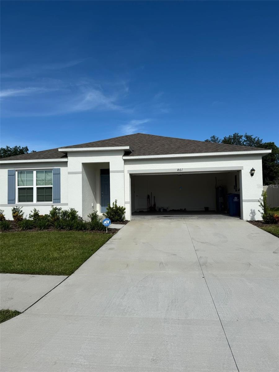 Newly built home in Haines City ready for a new family. Full security system with ADT cameras. Large backyard for entertaining. Large garage with ample parking in the driveway.