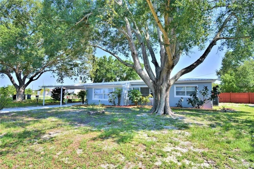 Photo of 321 Raymond Avenue, Frostproof, FL 33843 (MLS # W7882929)