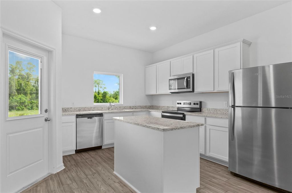 Photo of 547 Bay Leaf Drive, Poinciana, FL 34759 (MLS # TB8436023)