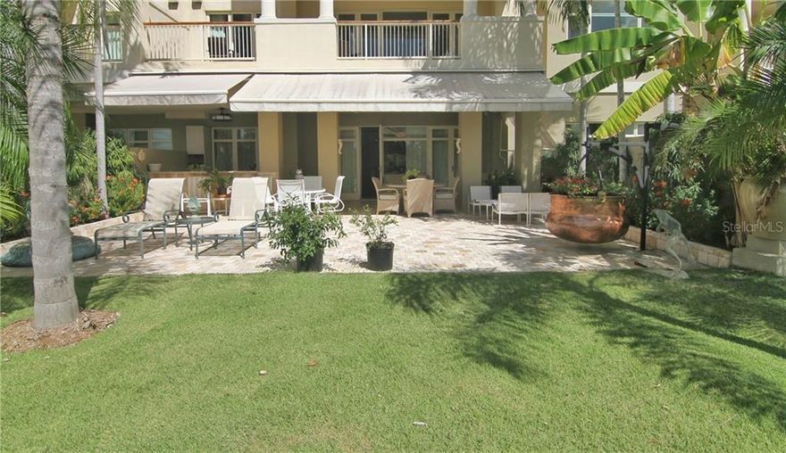 Plantation Village II ground floor unit with stunning views. Features 3 bedrooms 2.5 bathrooms, Living room, dining room with beautiful  stone wall, kitchen with top of the line appliances, big patio terrace overlooking Dorado Beach Golf course.