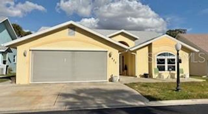 This is a must see 3 bedroom / 2 bath home that is located in the exclusive 55+ gated community of Lake Henry Estates. This spacious home has a lot to offer with granite counters tops in the kitchen, updated cabinetry and tile flooring.  The roomy master suite , has double sinks in the master bath and walk in title shower. The home had a new roof in 2024, energy efficient windows, hot water heater replaced in 2023, A/C is about 4 year old and the home is equipped with a generac generator.   Lake Henry Estate has a plenty amenities that create the true idea of Florida life style with large club house that has arts and crafts room, billiards, ball room, fitness room, bar, and more.  A 9 hole golf course, pool, tennis courts, shuffle board, bocce ball, boat dock and boat slips, RV and boat storage, community wood shop and dog park.  This is Florida living at its finest.  Set an appointment to get the full feel of this home and community.