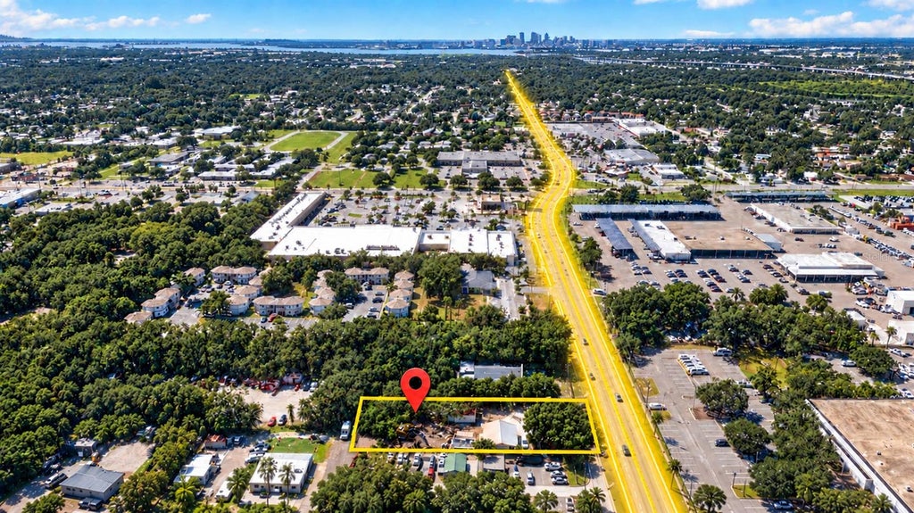 Photo of 8021 Palm River Road, Tampa, FL 33619 (MLS # TB8556519)