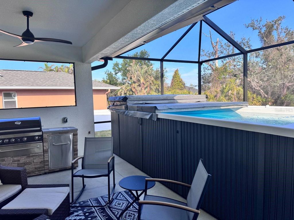 Photo of 26 Medalist Way, Rotonda West, FL 33947 (MLS # D6147062)