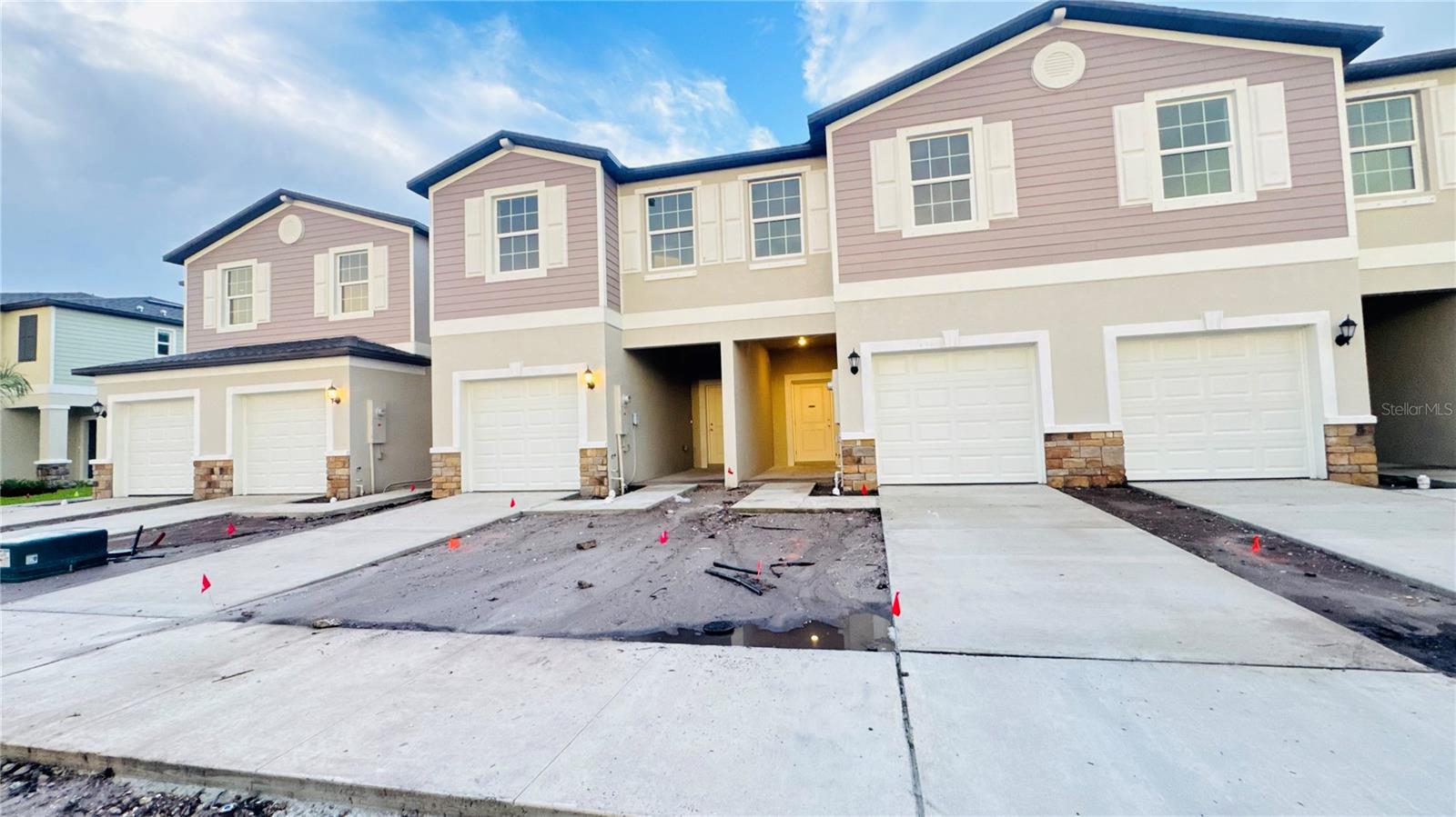 BRAND NEW HOME!! - MOVE-IN READY!! - This stylish two-story townhome boasts a modern open-concept design, seamlessly connecting the Great Room, kitchen, and dining area on the main floor. Sliding glass doors lead to a covered patio, perfect for enjoying outdoor moments. Upstairs, a loft connects a bedroom with an attached bathroom and a cozy owner’s suite with a walk-in closet. The home also includes a one-car garage. Please note, interior photos may differ from the actual model under construction. Townes at Southshore Pointe, located in sunny Ruskin, FL, offers new townhomes complete with a private community pool for residents. Conveniently situated near major highways, this community provides easy access across the Tampa Bay area.