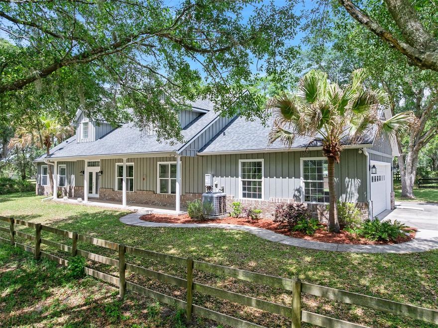 Welcome home to farm life at its finest in beautiful Glenwood, Florida! Your stunning meticulously-maintained estate home is waiting for you with endless views of 6.38 picture perfect rolling acres of turn-key horse property that can be seen from almost every room. This 3 bedroom, 2 bath farmhouse style home with nearly 2,300 sq ft of living space features many recent updates throughout and an open floor plan with office (or potential 4th bedroom) that offers spacious, comfortable living in one of the DeLand area’s most desirable neighborhoods. 

The home's main living area opens to a peaceful 27' x 32' covered and screened lanai with triple-sliding insulated doors and brick pavers, creating the perfect space for entertaining or relaxing in your hot tub while enjoying the private back yard. Outside, the back yard is surrounded by mature landscaping and beautiful live oaks, with a fire pit perfect for unwinding on a cool evening.

Highlights of the home include newer Luxury vinyl flooring, appliances (2019-2026), 2019 roof, 2018 HVAC, 2018 water softener, many electrical updates, new office French doors, crown molding throughout, built-in desk and shelving, and a spacious kitchen fully equipped with double built-in ovens, a 5-burner propane cooktop, a breakfast area, walk-in pantry, and so much more. 

A truly special feature of the property is the 1,700-square-foot 7 stall horse barn, which includes two large air conditioned spaces; one approximately 800 square feet and the other 630 square feet, each with their own bathroom. With one full bath and one half-bath in the barn, this flexible space is ideal for a home gym, workshop, craft room, or guest overflow, while still offering plenty of room for horses. The 5-acre fully fenced pasture features newer fencing, multiple gates, and an electronic gate encloses the property off for added convenience and privacy.

Ideally located in the popular Glenwood area, this property is close to horse trails, biking trails, Lake Woodruff Wildlife Refuge, and DeLeon Springs State Park, and the St. Johns River for tons of exploring. You are also just 10 minutes from historic award-winning downtown DeLand and 45 minutes from some of the world's most famous beaches!

Now is your chance to own this picturesque property!