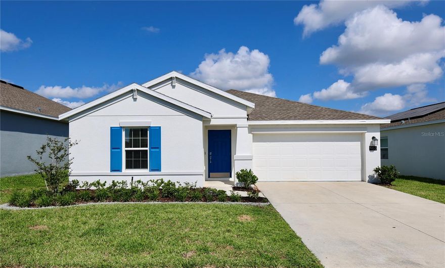 Step into modern Florida living in this beautifully maintained 3-bedroom, 2-bath home built in 2022, offering the perfect blend of style, comfort, and convenience. Featuring an open and inviting layout, this home showcases modern finishes throughout, including quartz countertops, solid wood cabinetry, stainless steel appliances, and tile flooring throughout the main living areas and bathrooms, with comfortable carpet in the bedrooms. Outside, enjoy added privacy with vinyl fencing and energy efficiency benefits from the installed solar panels. Located directly across from the community’s impressive master amenities, residents enjoy access to a large playground, basketball court, spacious pavilion, and expansive recreational green space perfect for gatherings and outdoor activities. Conveniently situated with easy access to the Florida Turnpike and just minutes from the Clermont Chain of Lakes, this location offers the best of Central Florida living with nearby shopping, dining, recreation, and commuting access. This property delivers exceptional value and lifestyle opportunity.