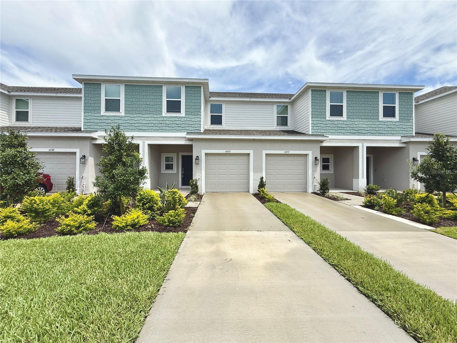 Enjoy comfortable living in this 3 bedroom, 2 and one half bathroom townhome in the desirable Townhomes at Azario in Lakewood Ranch. Featuring an open living room layout, plush carpet in the bedrooms, and a convenient upstairs laundry with washer and dryer included. Relax with a private view, from the living area and patio. Attached single car garage, perfect for extra parking or storage. Take advantage of the community pool with lounge chairs and cabanas, with nearby Lakewood Ranch amenities and parks in this sought after new neighborhood.