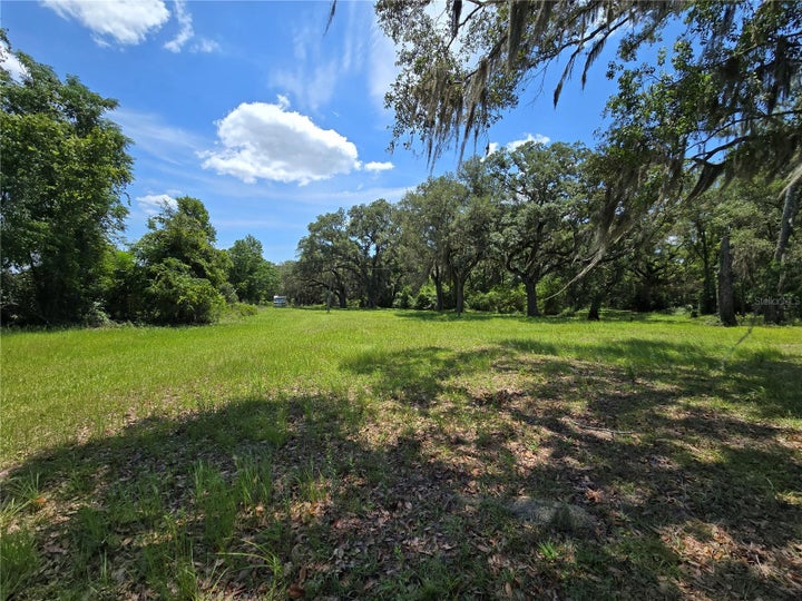 Photo 1 of 8 — 7563 SE COUNTY ROAD 405, BRANFORD, FL 32008
