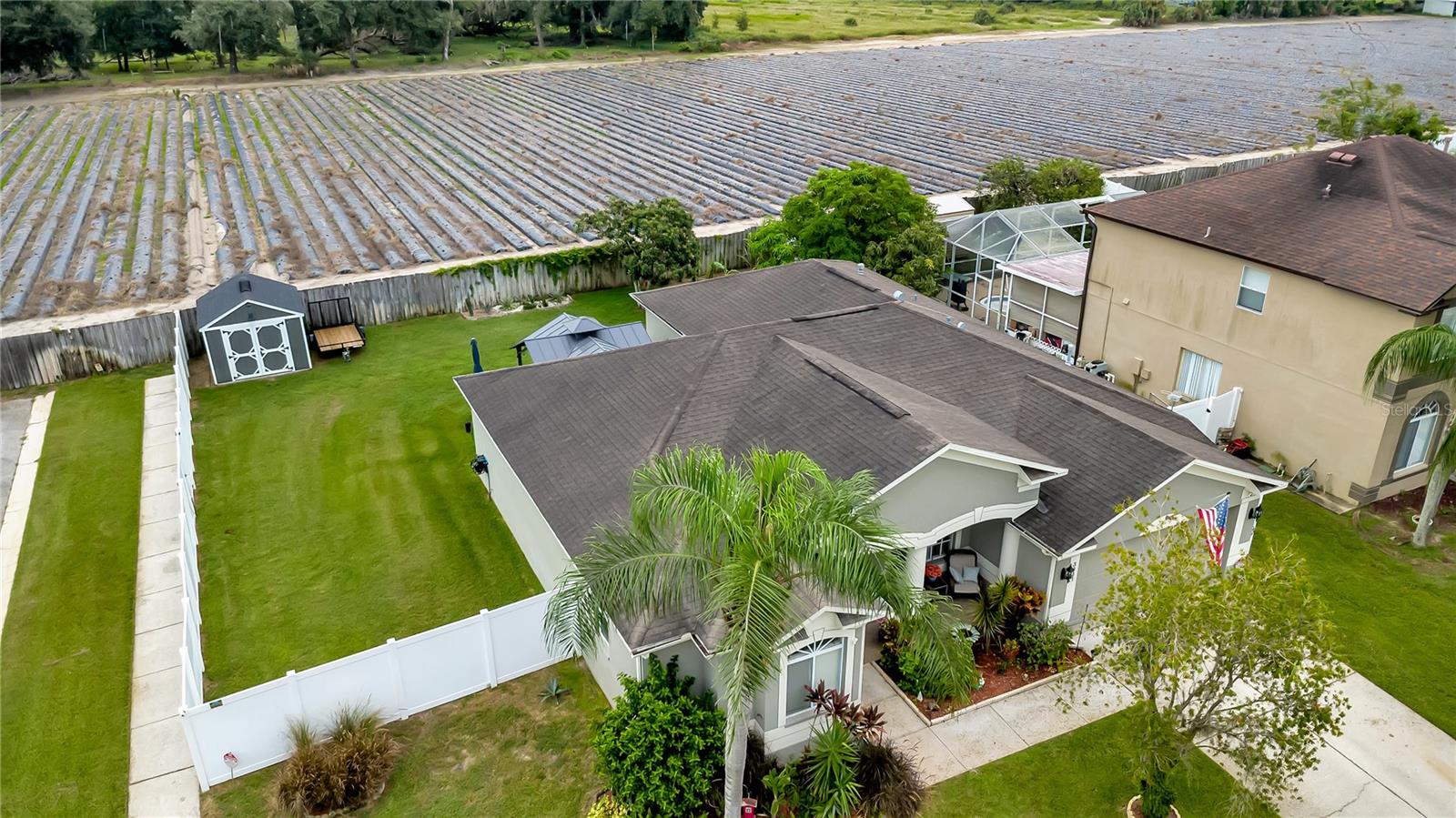The Valrico HOME you’ve been waiting for! A 3-bedroom, 2-bath, 2-car garage home with nearly 2,000 square feet of living space, set on an oversized .18-acre corner lot in the sought-after Somerset community. With a fully remodeled kitchen (2025), updated baths, no carpet, a fenced backyard oasis with GAZEBO, and double-entry gate - this property blends everyday comfort with designer-level style. Step through the solid wood front door into bright, open living area framed by vaulted ceilings, upgraded lighting, and ceramic tile floors that carry throughout. Formal living and dining spaces lead seamlessly into the heart of the home: a chef’s kitchen with veined granite counters, custom cabinetry with crown, custom backsplash, oversized island for seating and entertaining, butler’s station with wine refrigerator, elevated stainless appliance package, and glass-front display cabinets. Perfect for hosting, the open-concept design continues into the spacious family room with sliding glass doors opening to the lanai. The primary retreat offers direct backyard access and a spa-inspired bath featuring dual granite vanities, a garden soaking tub with window, a separate glass-enclosed shower, and a private water closet. Two additional bedrooms share an updated guest bath with custom cabinetry, modern finishes, and tiled shower & tub. The inside laundry room adds convenience with a premium washer/dryer set on pedastals. The outdoor living is ready for your creativity with plenty of space, a covered lanai, anchored gazebo with electrical, fan and lighting, a firepit area, and a sprawling fully fenced backyard with double-gate side entry—offering space for your RV, boat, or future custom pool! A newer shed provides even more storage. Updates give peace of mind with a roof (2018), Rheem HVAC system (2017), water softener (2023), upgraded irrigation on private well, newer windows, and even a mini-split AC to keep the garage cool and create a custom workshop! Somerset is one of Valrico’s most loved communities—quiet, established, with low HOA, no CDD, community amenities, and easy access to Brandon, Tampa, MacDill, and the Gulf Coast beaches. Here, you’re close to shopping, dining, top schools, and commuter routes while enjoying a lifestyle that feels like a private retreat. Homes like this don’t just check the boxes—they raise the bar. Schedule your private showing today and discover why this one won’t last.