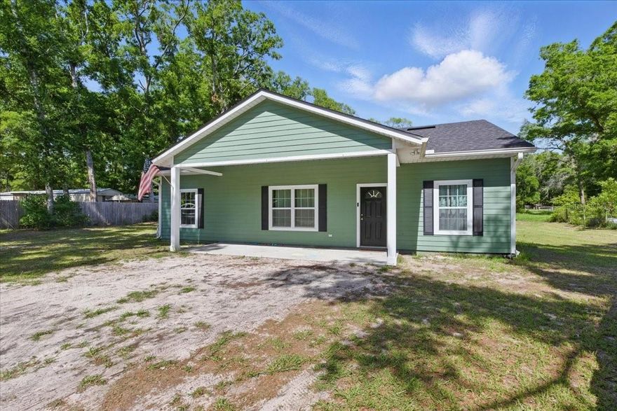 PERFECT 2021 Custom 2 bedroom/2 bathroom home located in the heart of Bell FL. This home is located in Gilchrist County and offers low property taxes, a bike ride to the local public schools, awesome dining and shopping opportunities. This property sites on .87 acres (3 lots) and a beautiful open floorpan. As you enter the home you will see gorgeous laminate flooring throughout. A large living room space, open kitchen with granite countertops and stainless steel appliances and a nice dining room space. This floor plan is a split floor plan with bedroom on each side. Master bedroom to the left with a nice open bathroom, featuring a walk in shower and garden tub as well as dual sinks. Guest bedroom is spacious with guest bathroom with walk in shower , sink and makeup counter. Spacious laundry room with exit to the backyard. A nice open backyard offering blank canvas to make your own. Perfect starter home or forever home, call today for YOUR tour! Accepting ALL loans, VA, USDA, FHA , Conventional and cash