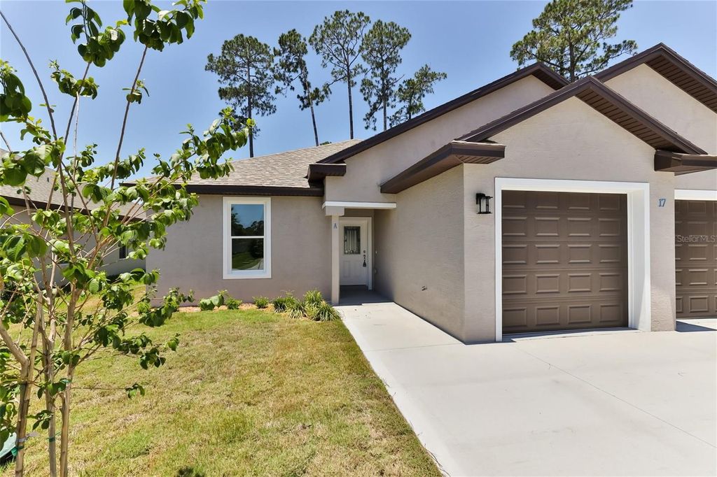 Photo of 37 Regent Lane #B, Palm Coast, FL 32164 (MLS # FC316406)