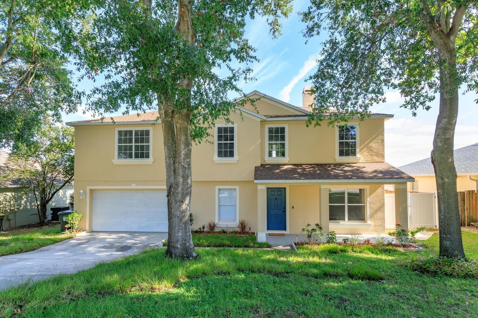 Welcome to your Home in the heart of Clermont’s rolling hills! This FULLY renovated 5-bedroom, 2.5-bath home spans 3,106 sq. ft. and offers modern luxury with amazing views from its high-elevation perch. Facing north, the rear of the home showcases unobstructed, stunning vistas, perfect for enjoying cool breezes on the new paver patio with a cozy fire pit or relaxing on the screened patio. Step inside to discover a bright, open interior with fresh paint inside and out, new wide-plank premium luxury vinyl flooring, 5-inch baseboards, and LED lighting throughout. The gourmet kitchen is a chef’s delight, featuring new quartz countertops and backsplash, custom cabinetry, a porcelain farm sink, and a massive walk-in pantry. The open-concept design flows seamlessly into the family room, with separate dining and living rooms for versatile entertaining. Upstairs, the primary suite is a true retreat, boasting an expansive bedroom, an enormous walk-in closet, and a spa-like primary bath with a new vanity featuring dual sinks and high-end fixtures, a garden tub, and a separate shower. A bonus loft offers flexible space for a home office, playroom, or media area. The renovated guest bath also features a new vanity with dual sinks for added convenience. This home is equipped with modern upgrades, including two HVAC systems (2025 & 2021), brand new hot water heater, a 2018 roof, new landscaping with irrigation, and a fenced backyard. Enjoy the convenience of a separate laundry room with LG washer and dryer, plus ample storage throughout. Nestled in a prime location zoned for Lake Minneola High School, this home is just minutes from charter schools, golf courses, shopping, the library, and Lake Sumter College. With its spacious layout, high-end finishes, and unparalleled views, this huge family home is a rare find in Clermont’s sought-after hills. Don’t miss this ONE! Schedule your private tour today!