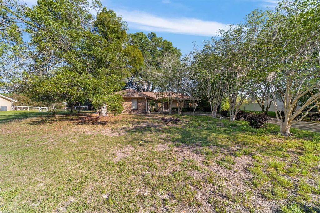 Photo of 7385 SW 103rd Lane, Ocala, FL 34476 (MLS # O6402671)