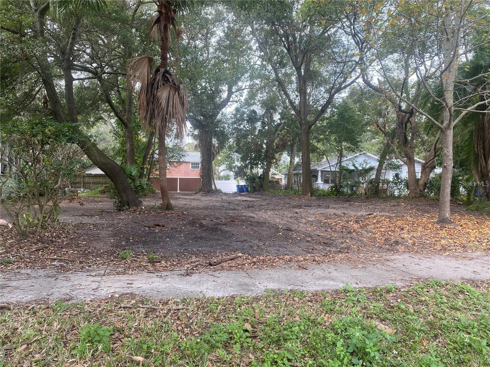 Large 135 feet deep vacant zoned IC commercial lot ready for an investor or owner who would like passive income. Included in the price are a complete set of permit ready plans for emergencey short term housing( which is an approved use) in the front of the property and an ADU in the back. The property is zoned IC which gives the owners so many options medical office, Community Residential Home, live work/place etc. see attached matrix. Lot has alley access so it makes it perfect all of these. Land is located within 1 block of St Anthony's Hospital on a quiet brick street. So many options with this zoning you could possibly work/ live in one side and rent the other side to traveling health care professionals with this prime downtown location. Sober/group home living any short term housing like this is an approved use.