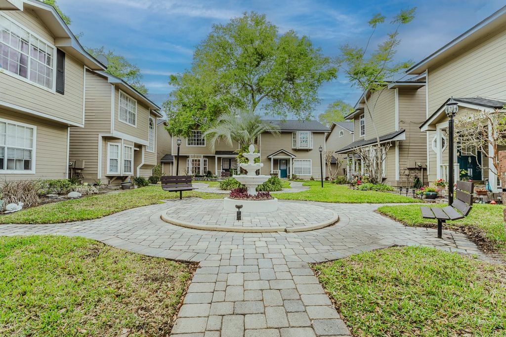 Photo of 6030 Scotchwood Glen #103, Orlando, FL 32822 (MLS # O6393811)