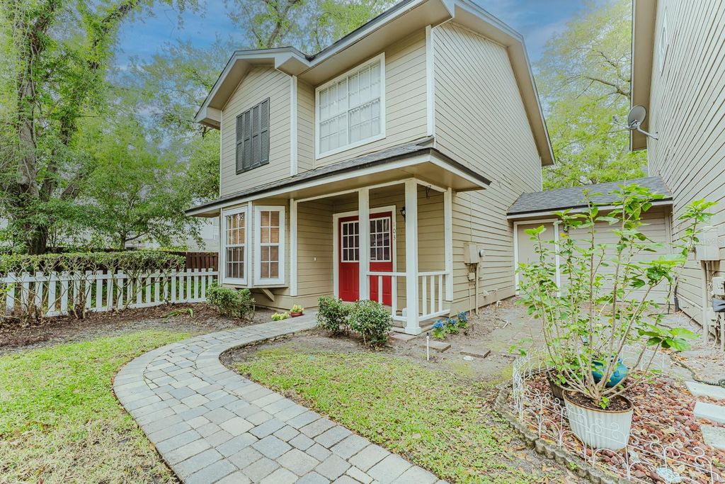 Photo of 6030 Scotchwood Glen #103, Orlando, FL 32822 (MLS # O6393811)