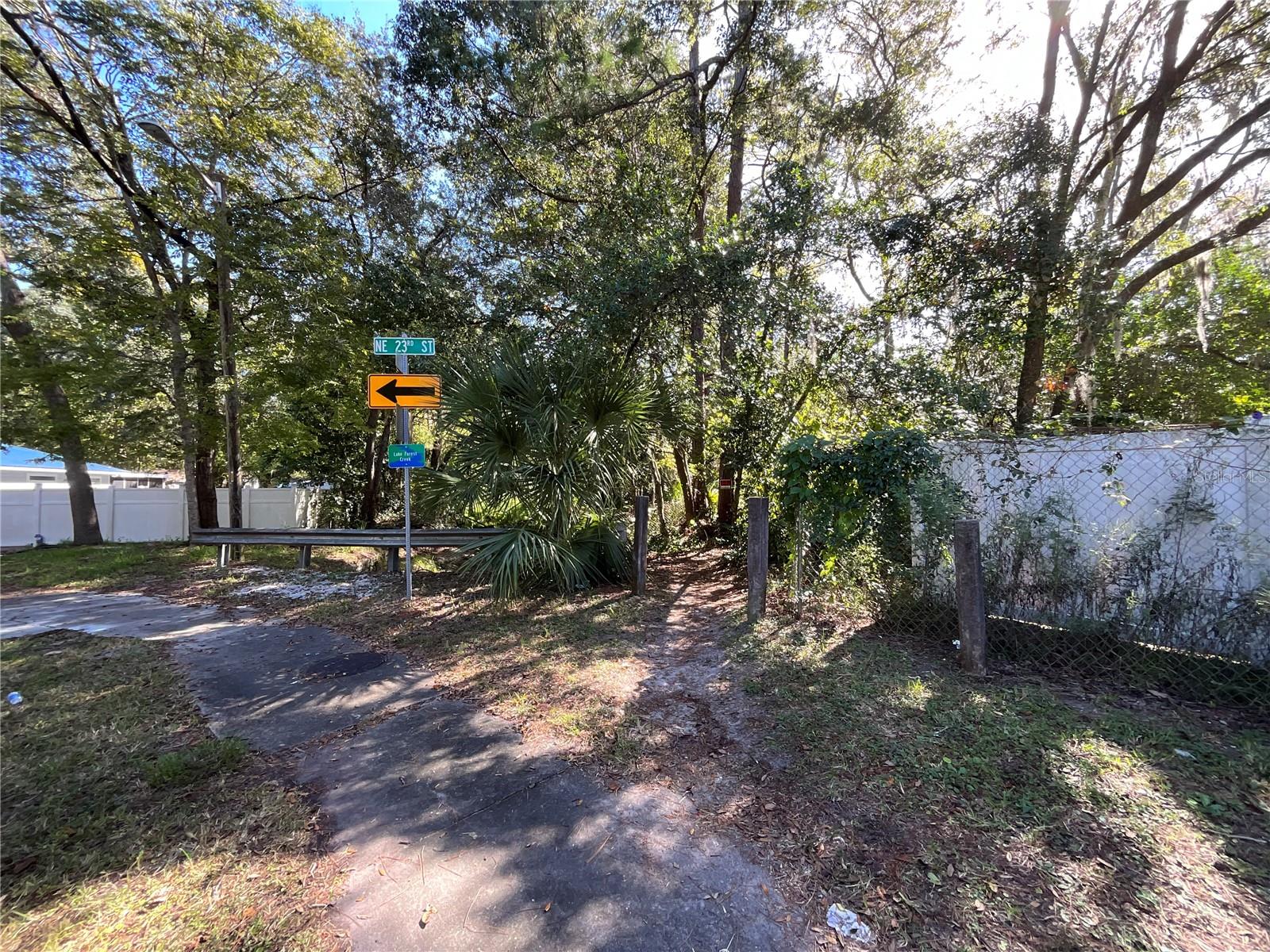 One and Half miles to city hall and two and half miles to the University, four and half to VA and Shands Hospital. Property is located in the Gainesville Enterprise Zone (Discount Permitting, development fees, occupational licenses, sales tax, federal taxes and more.....). Also available CITY TRANSIT.