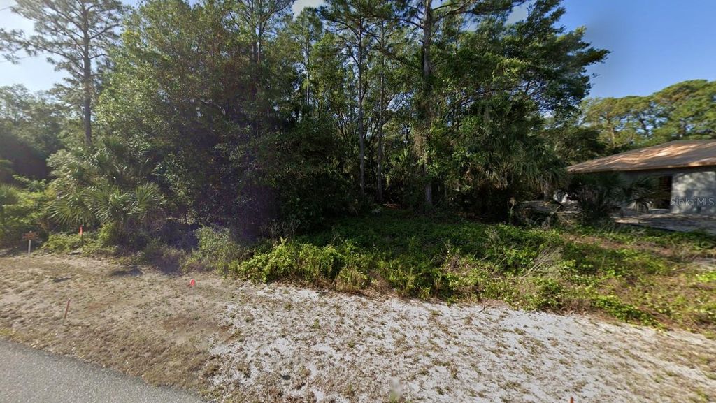 Photo of 18341 Laramie Avenue, Port Charlotte, FL 33954 (MLS # O6316712)