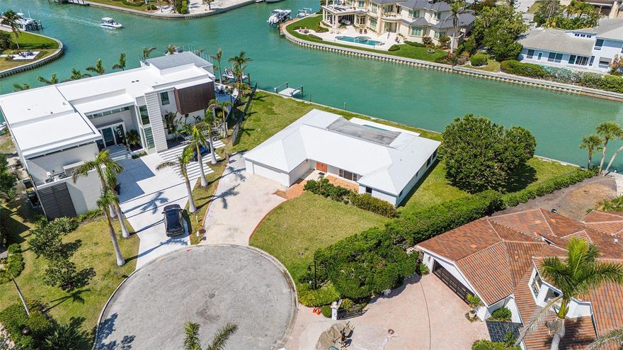 Rare opportunity in highly desirable Bird Key 200 Ft of waterfront on a cul-de-sac with views to downtown Sarasota. This 2,251 square foot pool home has vaulted ceilings in the Living Room plus a spacious Family Room with great water views from both rooms. The bathrooms and Kitchen were renovated in 2012. Metal roof 2016, A/C 2013. Remodel or build new on this beautiful property in a prime location.