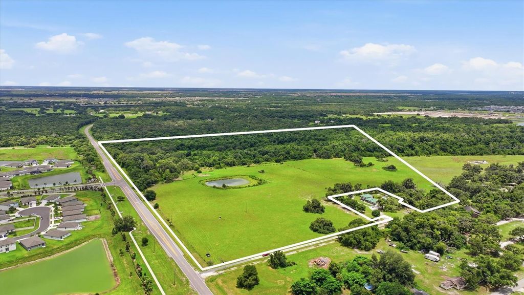 Photo of 13805 County Road 675, Parrish, FL 34219 (MLS # A4697392)