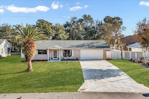 Photo of 93 Freeport Lane, Palm Coast, FL 32137 (MLS # FC316145)