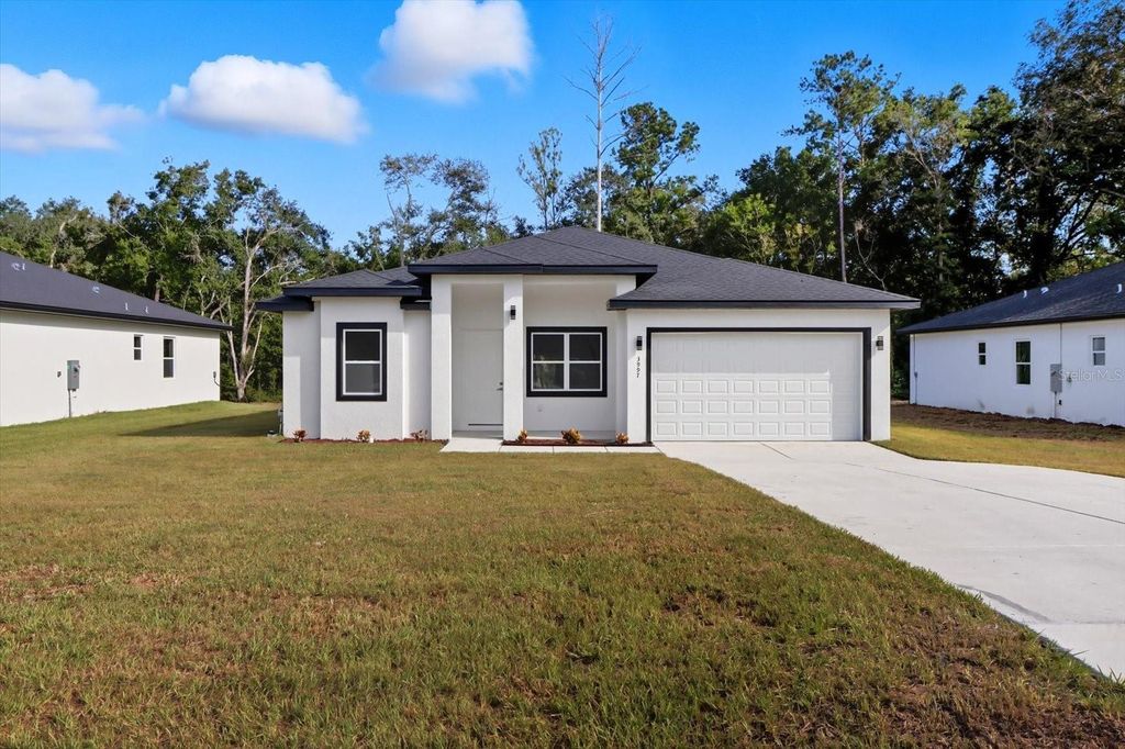 Photo of 3999 SW Shorewood Dr, Dunnellon, FL 34431 (MLS # O6354036)