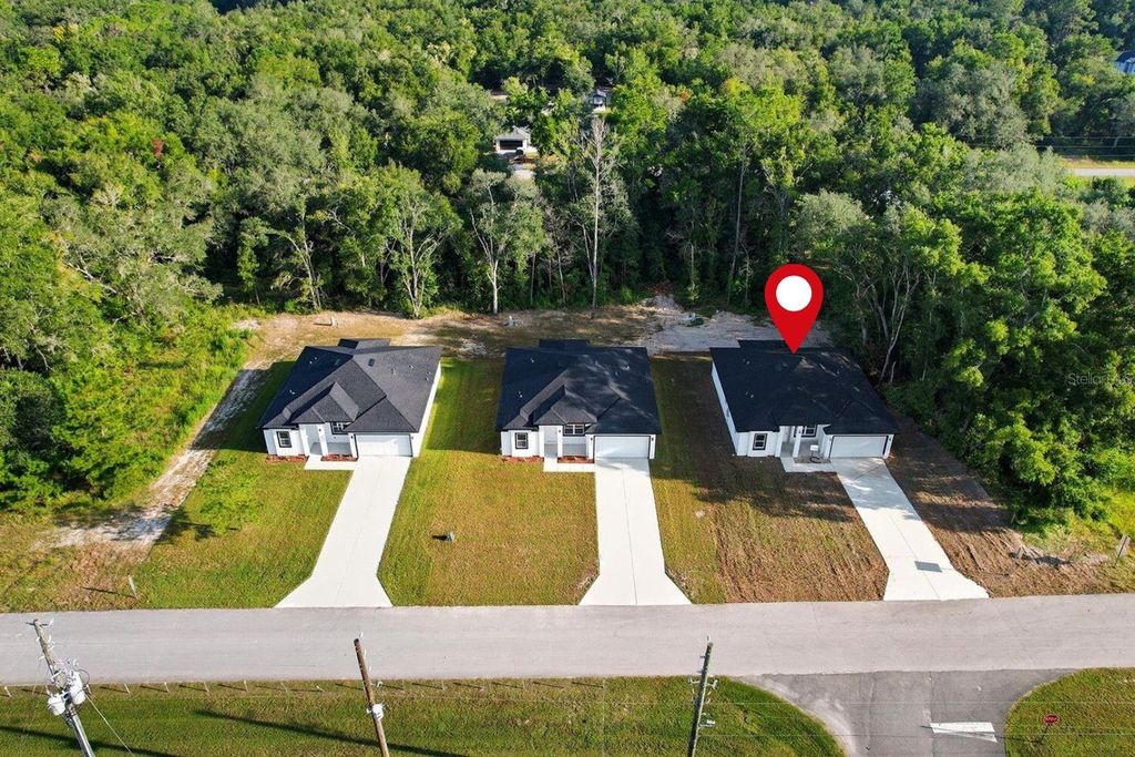 Photo of 3999 SW Shorewood Dr, Dunnellon, FL 34431 (MLS # O6354036)