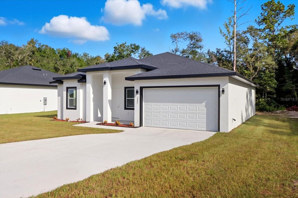 Photo of 3999 SW Shorewood Dr, Dunnellon, FL 34431 (MLS # O6354036)