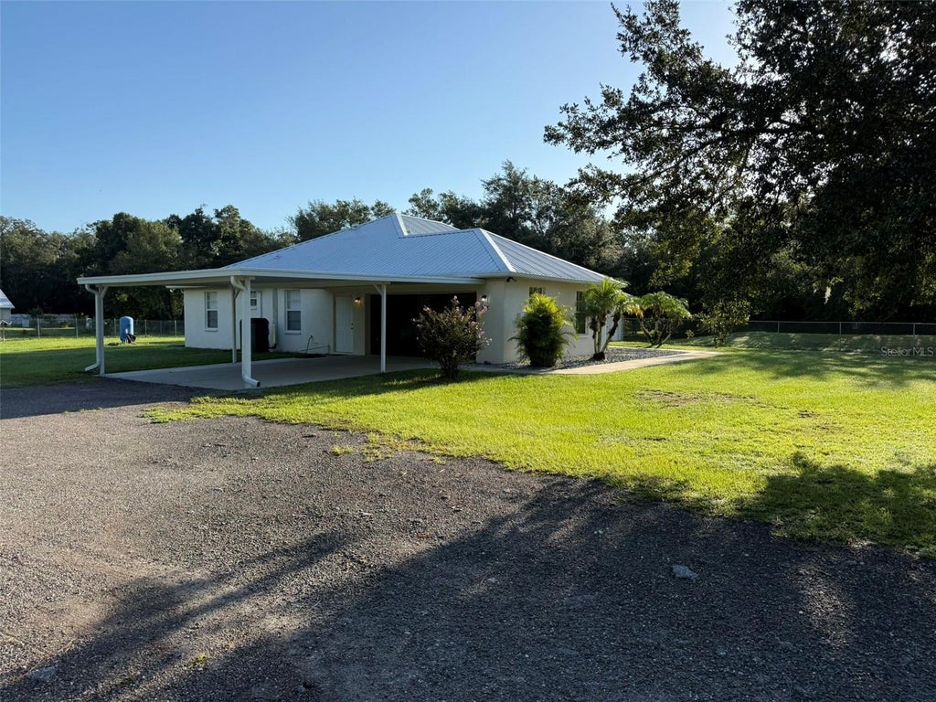 Photo of 1978 Wooten Road, Dover, FL 33527 (MLS # L4964718)
