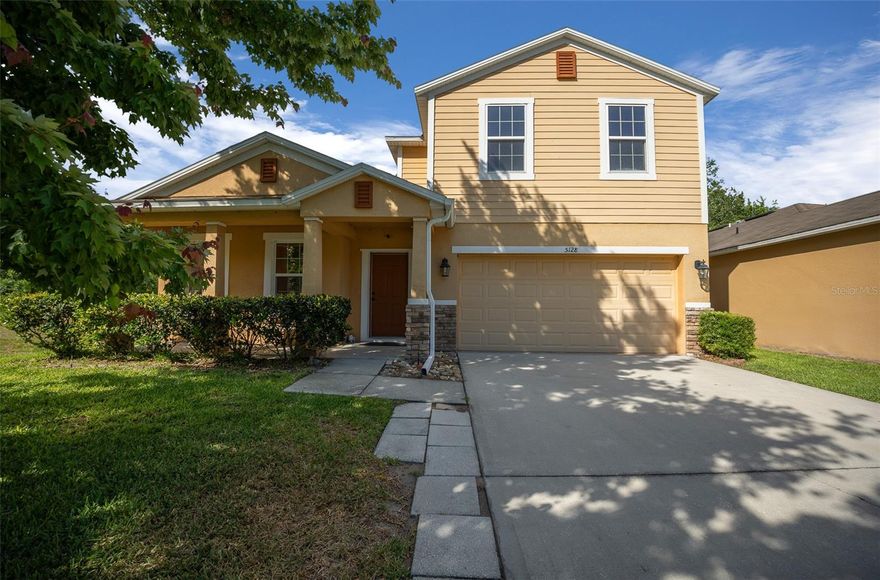 Welcome to this beautiful 5-bedroom, 3.5-bath, two-story home located near stunning Lake Harris and the chain of lakes-perfect for boating, fishing, and outdoor fun. Nestled in the highly desirable gated community of Oak Bend, you'll enjoy peace of mind, tree-lined streets, sidewalks for evening strolls, and access to sparkling community pool Tucked away at the end of a quiet cul-de-sac, this home offers added privacy with it's prime location near the edge of the neighborhood. Step inside to find a spacious living room that flows into a large great room combining the kitchen, dining room and family space, perfect for entertaining or relaxed family living. The kitchen and dining area overlook a screened-in porch, ideal for enjoying Florida evenings. Downstairs features a convenient half bath for guest, while upstairs you'll find a living / game room and four generously sized bedrooms with two full bathrooms. The luxurious master suite is on the main level and offers a true retreat with a massive walk-in closet and spa-like bathroom. Enjoy relaxing evenings in your oversized hot tub, or enjoy the community pool, and with solar panels already installed, you'll benefit from significantly reduced electric bills. This home has all the space, comfort, privacy and a wonderful commubity.
