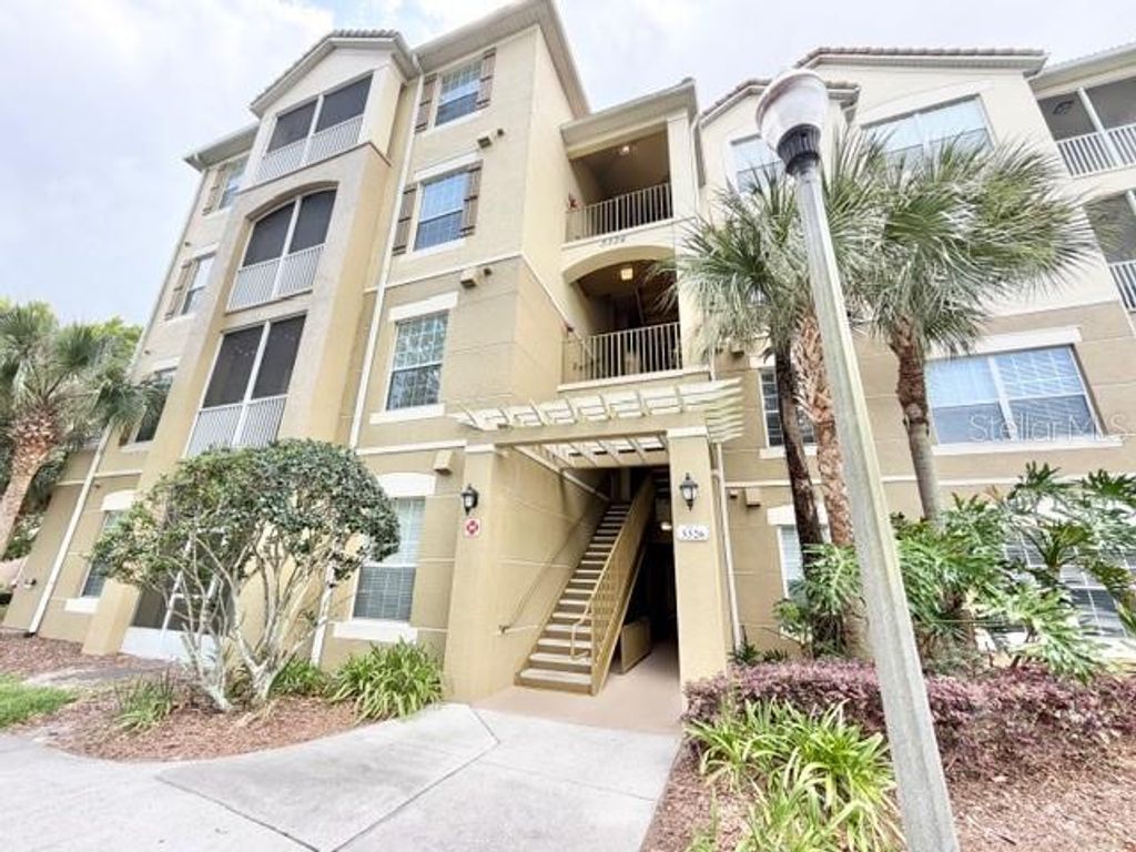 Photo of 3326 Robert Trent Jones Drive #202, Orlando, FL 32835 (MLS # O6395697)