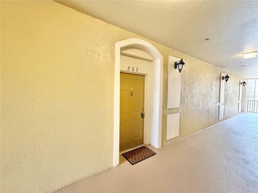 Photo of 3326 Robert Trent Jones Drive #202, Orlando, FL 32835 (MLS # O6395697)