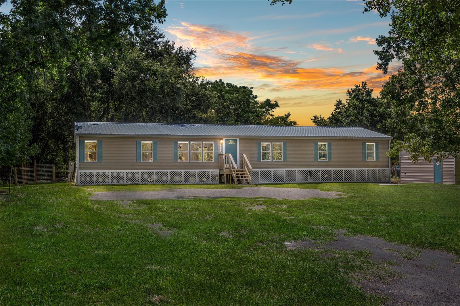 Bring the horses, bring the toys, bring the dream!
Tucked away on 2 high & dry acres in St. Cloud, this country property gives you the space and freedom you’ve been craving—without the restrictions of an HOA. Your horses will love the "no climb" fence, and you’ll love having a 2022 metal workshop ready for all your projects and storage needs. Inside, the home offers a comfortable blend of charm and important updates—no carpet anywhere, new flooring & sub-flooring (2024) and granite countertops in the kitchen and baths. The primary suite is a retreat all its own, with a soaker tub and a huge flex room perfect for an office, nursery, or reading nook. Major improvements have already been done for you: metal roof, AC, and well filtration (2022), plus spray foam insulation and instant hot water heater (2024). Move in and start enjoying the country life, with Lake Nona conveniences just minutes away.