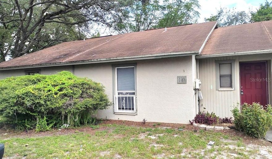 Welcome Home! Nice condo!. One Story Villa, appliances, vaulted ceilings, fireplace, privacy fence, assigned parking and more. This well priced 2 bedroom 1 bath condo is conveniently located near I-275 and USF.