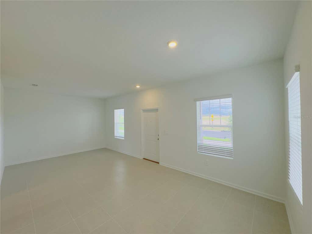 Photo of 5872 Meditation Drive, Clermont, FL 34714 (MLS # O6429599)