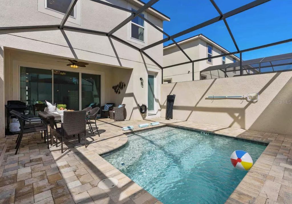 Photo of 1604 Carey Palm Circle, Kissimmee, FL 34747 (MLS # O6352447)