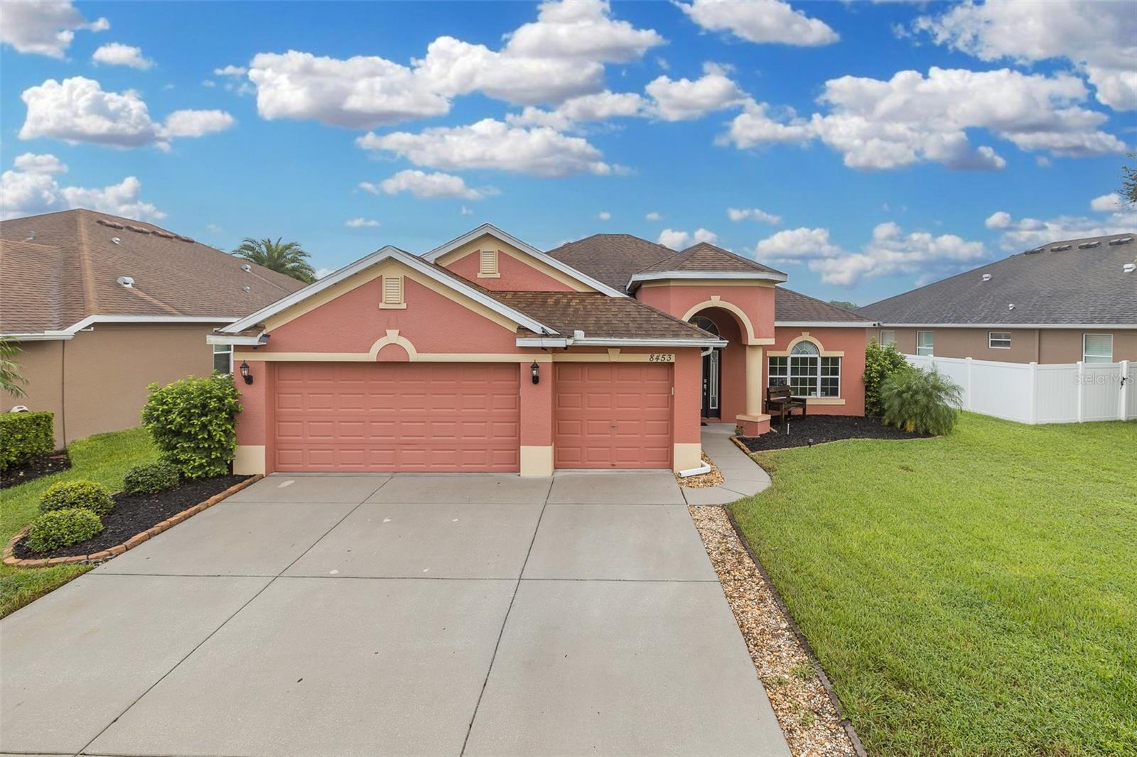 Stunning 4 Bedroom, 3 Bathroom Home with 3-Car Garage on Premium Pond Lot! Welcome to your dream home! Perfectly situated on a premium waterfront lot, this elegant 4-bedroom, 3-bathroom residence offers breathtaking panoramic pond views and a lifestyle of comfort, privacy, and luxury. Inside, you’ll find a thoughtfully designed open floor plan with rich wood and tile flooring flowing seamlessly throughout. A versatile office/den provides the ideal space for working from home or creating a quiet reading retreat. The private in-law suite with its own full bathroom is perfect for guests, multigenerational living, or extended stays. The heart of the home features a spacious living area and gourmet kitchen, ideal for entertaining and family gatherings. Oversized windows & sliding glass doors invite in natural light while framing the serene water views. Step outside onto the expansive screened lanai, where you can unwind in style and soak in the incredible waterfront scenery. Whether hosting or relaxing, the brand-new custom 8-person hot tub/spa with waterfall sets the stage for evenings under the stars with friends and family. The open floor plan lives large and owner's suite is spacious featuring a walk-in closet & pampering en suite bathroom with his/her vanities, relaxing garden tub & large shower. The secondary bedrooms are all generously sized & 2 guest bathrooms and a roomy laundry room complete the fabulous floor plan. This home combines elegance, function, and unmatched outdoor living in one perfect package. This owner has made 100k in recent upgrades: NEW hot water heater, NEW extended 16 x 32 screened lanai with no seeum screen & oversized seamless gutters, NEWER 8 person spa w/waterfall, NEW pavered patio, walkway & firepit area, NEW fencing w/4 gates (completely fenced back yard), NEW Govee Lighting, NEW patio lighting, NEW landscaping, professionally installed heavy duty shelving in garage & addition of wall to enclose bedroom 4 into a PRIVATE in-Law Suite w/en suite bathroom. Waters Edge community has much to offer its residents: gated resort-like community offering an array of amenities such as Fishing Lake, COMMUNITY POOL, Clubhouse, Sport Court, Playgrounds, Parks and Fitness Center. HOA fees cover cable, internet, trash, and various recreation amenities making Waters Edge extremely desirable. Located close to many shops, restaurants, short drive to Tampa International Airport, beautiful local beaches & more. Don't let this GEM slip away! Don’t miss the opportunity to make this stunning waterfront retreat yours!
