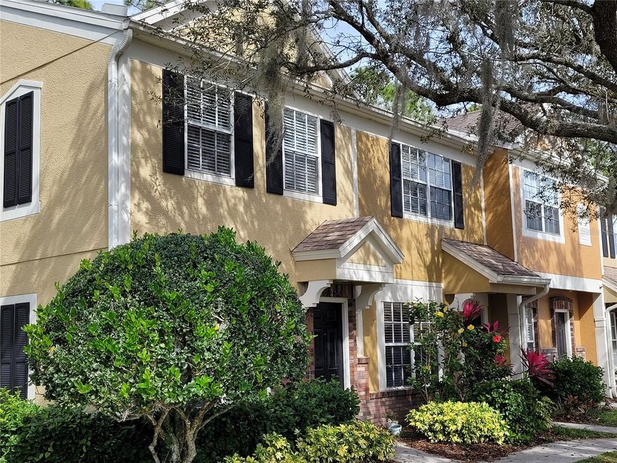 MUST SEE!!!  Spectacular fully renovated 2-bed 1.5-bath townhouse located in the desirable Westchase community.  New kitchen with all new stainless steel appliances, undermount cabinet lights, and new porcelain tile and hardwood flooring throughout and a brand new modern main bathroom and all doors are replaced and new air condition unit.  A must see if you are looking for a starter home in a fantastic community with affordable HOA fees and a great school district.  End unit ensure privacy with additional green space for outdoor relaxing.  HOA fees cover exterior maintenance, water, sewer, trash, grounds maintenance and roof reserves.  As a resident of Westchase, you'll have access to community amenities, including two pools, tennis courts, playgrounds, and parks.