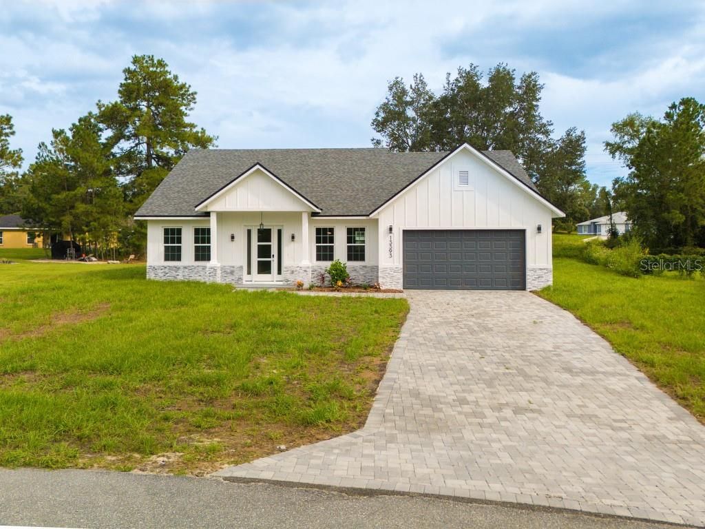 Photo of 13393 SW 43rd Ave Rd, Ocala, FL 34473 (MLS # O6343876)