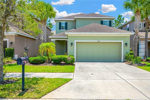 Photo of 16065 Bella Woods Drive, Tampa, FL 33647 (MLS # O6412736)