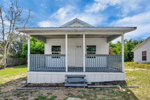 Photo of 209 Piney Avenue, Lake Wales, FL 33898 (MLS # S5149492)