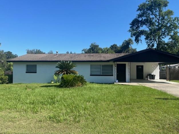 Investor Alert! Charming 3 bedroom 2 bath block home with a 2 car carport, and an inground pool, located in a very sought-after area of SE Ocala. Living room with fireplace, spacious kitchen with eating area, and a large Sunroom off of the kitchen overlooking the backyard. Huge inside laundry room. Concrete block storage building (250 sq. ft.) in the rear yard behind the pool. The depth of the pool in the deep end is 12 feet. The backyard provides the perfect space for relaxation or entertaining, and the home is nestled in an established neighborhood in the heart of Ocala. This property offers a spacious layout with plenty of natural light and comfortable living areas. Just minutes to Publix, drug stores, 2 major hospitals, doctors offices, dining, shopping, and historic downtown Ocala. With its convenient location near schools, parks, and major roadways, this home is ideal for those seeking both comfort and accessibility.