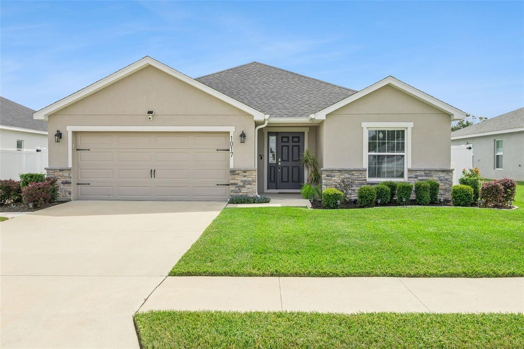 Photo of 1017 Montgomery Lane, Polk City, FL 33868 (MLS # O6445939)