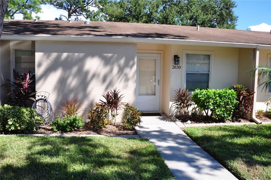 Photo of 2630 Woodgate Lane #G3, Sarasota, FL 34231 (MLS # TB8431315)