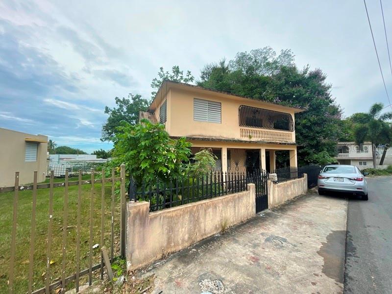 Multi-family property composed of 3 units. Unit 1 is located on the first floor and it has 1 bedroom and 1 bathroom; Unit 2 is located on the
second floor and it has 3 bedrooms and 2 bathrooms and Unit 3 is located on the first floor and it has 1 bedroom and 1 bathroom. It has approx. 0.17 acre.