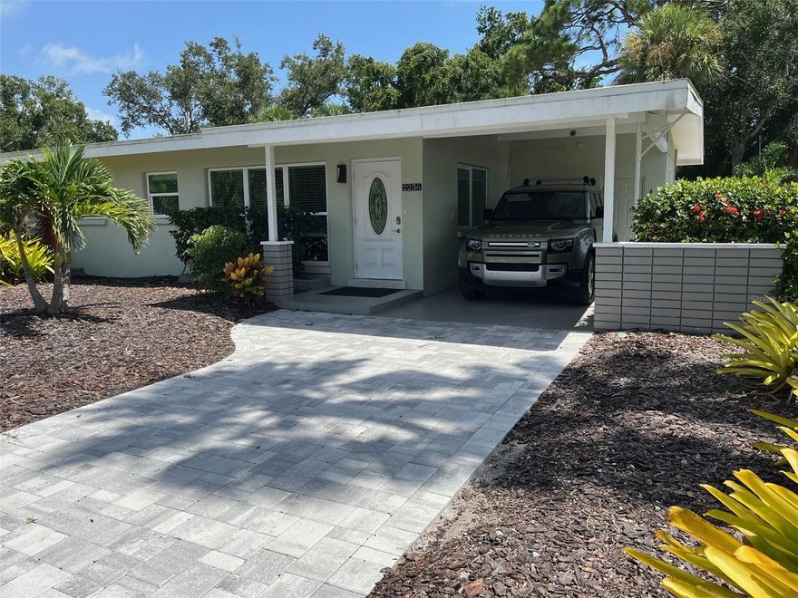 **SELLER WILL CONSIDER OWNER-FINANCING..!! Totally renovated and move-in ready 2 BR / 2BA true mid-century modern home, open concept design with vaulted ceilings exposed beams, hurricane impact low-E windows and doors, professionally restored terrazzo floors throughout, re-stuccoed exterior block construction with freshly painted exterior and interior and paver driveway. New elastomeric roof coating, shaker style kitchen cabinets with soft-close doors and solid plywood boxes, large peninsula, marble countertops, updated bathrooms, master bedroom with en-suite and walk-in cedar closet, two additional cedar closets, air-conditioned laundry room, LED lighting throughout, home security and fire alarm equipped, Florida-room with slanted modern wall of windows that can be used for multi-purposes. Large lot (7620 sq.ft.), with fully fenced back yard with new large paver patio area, grass lawn, irrigation system, night lighting, mature trees for shade and new Tuff Shed for storage/tools. This is a low maintenance home with underground power lines located in a VERY high sought after area with NO HOA, Short walk to Southside Village and Sarasota Memorial Hospital, and just 1.5 miles south of downtown... minutes from restaurants, shopping, Bay Park, Siesta Key and St. Armand's Circle.  * "Seller is a Licensed FL Real Estate Agent".