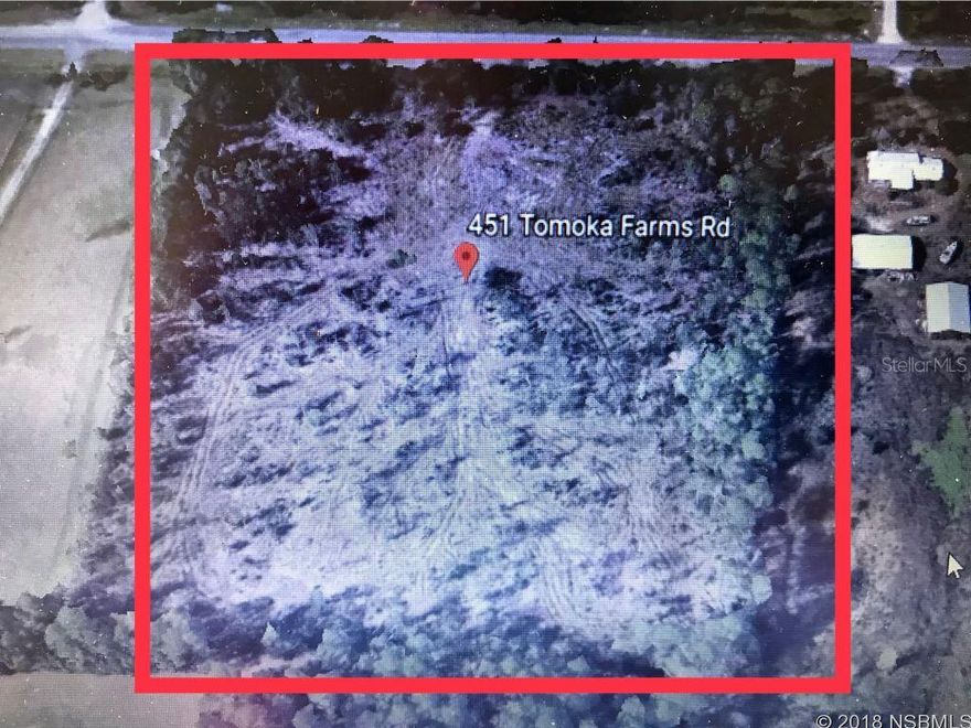 Spectacular 10.1 acre property in East Volusia County. Located minutes from New Smyrna Beach on paved CR 415, this property is within 15 minutes of a world class beach resort town.; Cleared: Partial ;Water: Holding Tank