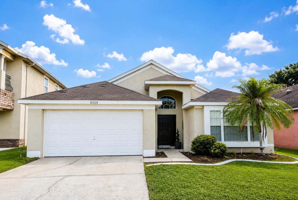 Photo of 6539 Cherry Grove Circle, Orlando, FL 32809 (MLS # O6428220)